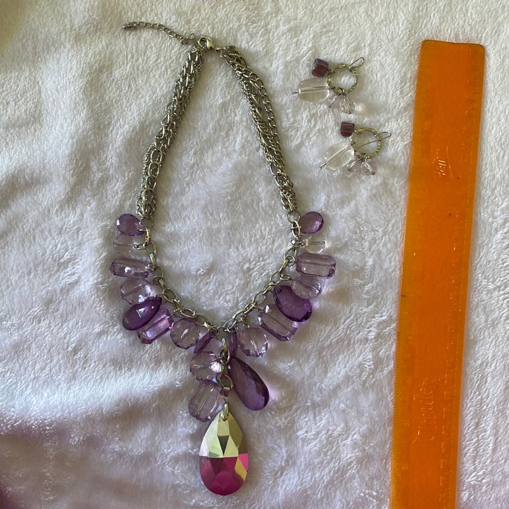 Silver and purple necklace and earring set.